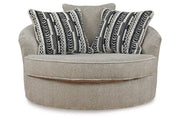 Calnita Sisal Oversized Swivel Chair and Ottoman -  Ashley - Luna Furniture