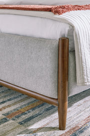 Lyncott Brown California King Upholstered Bed with Mirrored Dresser from Ashley - Luna Furniture