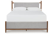 Lyncott Brown California King Upholstered Bed from Ashley - Luna Furniture