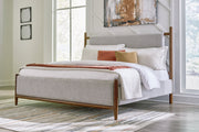 Lyncott Brown California King Upholstered Bed with Mirrored Dresser from Ashley - Luna Furniture