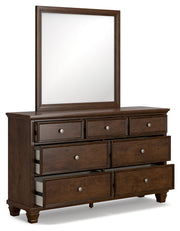Danabr Brown King Panel Bed with Mirrored Dresser from Ashley - Luna Furniture