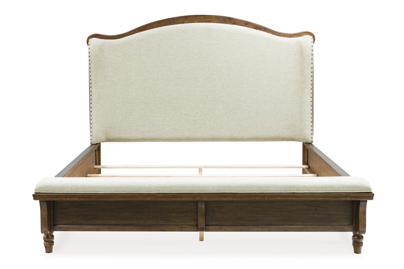 Sturlayne Brown California King Upholstered Panel Bed from Ashley - Luna Furniture