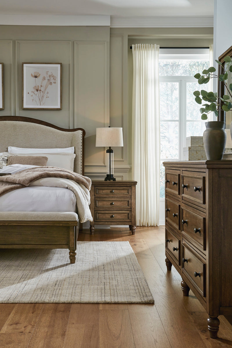 Sturlayne Brown Upholstered Panel Bedroom Set from Ashley - Luna Furniture