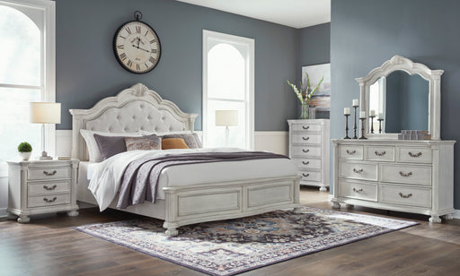 Montelaine Antique White King Upholstered Panel Bed from Ashley - Luna Furniture