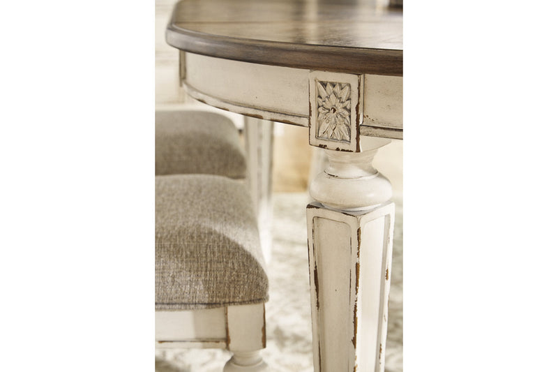 Realyn Chipped White Oval Dining Table and 6 Ladder Back Chairs from Ashley - Luna Furniture