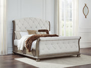Ardenfield California King Upholstered Sleigh Bed with 2 Nightstands in Light Brown from Ashley - Luna Furniture