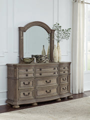 Ardenfield King Upholstered Sleigh Bed with Mirrored Dresser in Light Brown from Ashley - Luna Furniture