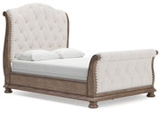 Ardenfield Queen Upholstered Sleigh Bed with Dresser and 2 Nightstands in Light Brown from Ashley - Luna Furniture
