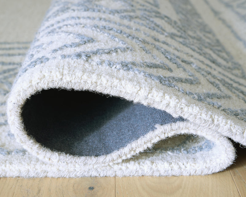 Azelhurst Blue/Ivory/Gray 5' x 7' Area Rug - R407852