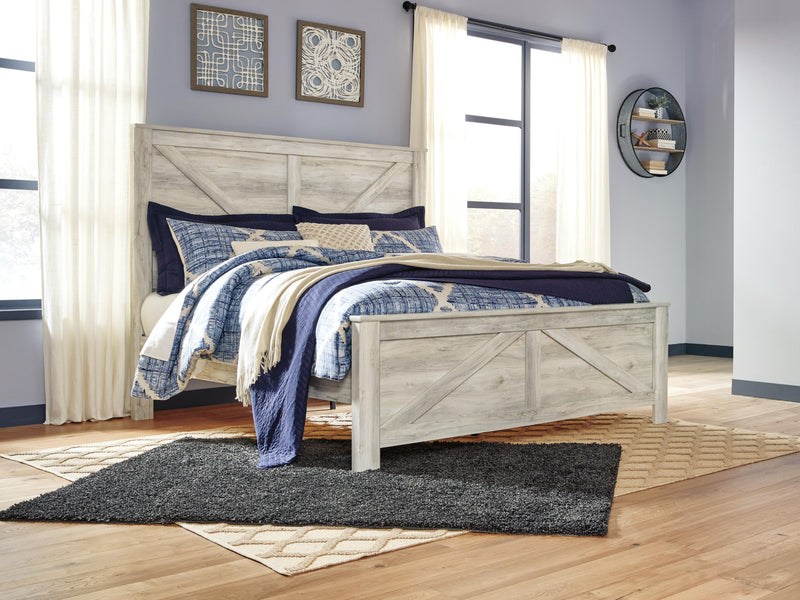Bellaby King Crossbuck Panel Bed with Mirrored Dresser and Chest in Whitewash - PKG004703