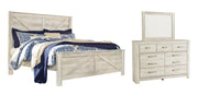 Bellaby King Crossbuck Panel Bed with Mirrored Dresser in Whitewash - PKG004698