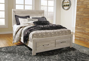 Bellaby Queen Platform Bed with 2 Storage Drawers with Mirrored Dresser in Whitewash - PKG004719