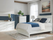 Bostwick Shoals Queen Panel Bed, Dresser, Mirror and Chest in White - PKG021575