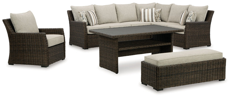 Brook Ranch Outdoor Sectional Set with Lounge Chair and Coffee Table in Brown from Ashley - Luna Furniture