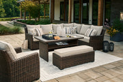 Brook Ranch Outdoor Sectional Set with Lounge Chair and Coffee Table in Brown from Ashley - Luna Furniture