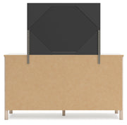 Cadmori Queen Upholstered Panel Bed with Mirrored Dresser and Chest in Two-tone from Ashley - Luna Furniture
