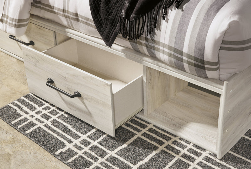 Cambeck King Panel Bed with 4 Storage Drawers with Mirrored Dresser and 2 Nightstands in Whitewash - PKG003027