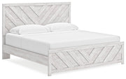 Cayboni King Panel Bed with Mirrored Dresser in Whitewash - PKG019173