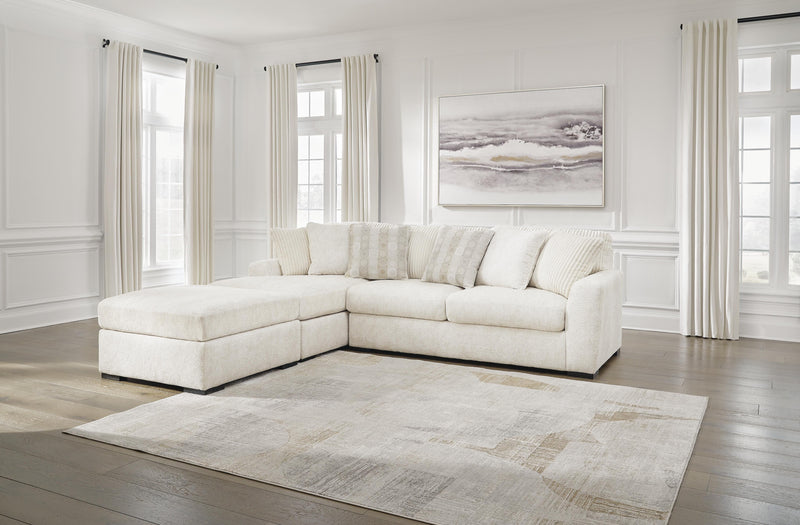 Chessington 2-Piece Sectional with Ottoman in Ivory - PKG018570