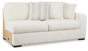 Chessington 2-Piece Sectional with Ottoman in Ivory - PKG018570