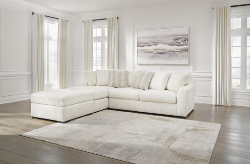 Chessington 2-Piece Sectional with Ottoman in Ivory - PKG018570