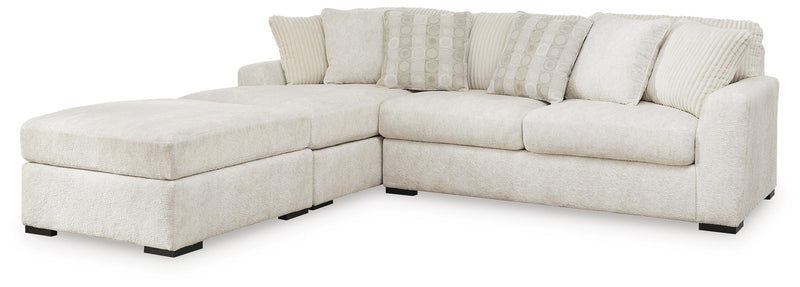 Chessington 2-Piece Sectional with Ottoman in Ivory - PKG018570