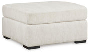 Chessington 2-Piece Sectional with Ottoman in Ivory - PKG018570