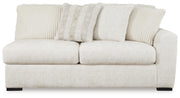 Chessington 2-Piece Sectional with Ottoman in Ivory - PKG018570