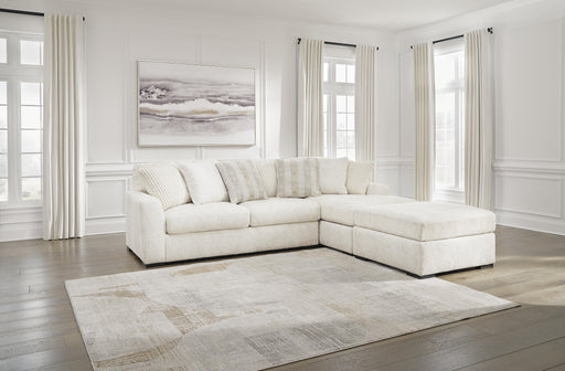Chessington 2-Piece Sectional with Ottoman in Ivory - PKG018571