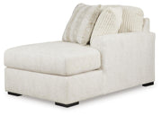 Chessington 2-Piece Sectional with Ottoman in Ivory - PKG018571