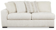 Chessington 2-Piece Sectional with Ottoman in Ivory - PKG018571