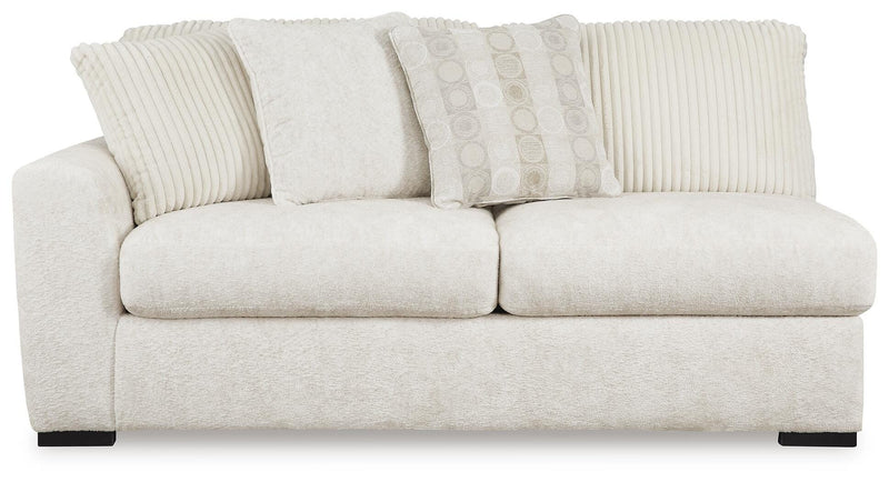 Chessington 2-Piece Sectional with Ottoman in Ivory - PKG018571