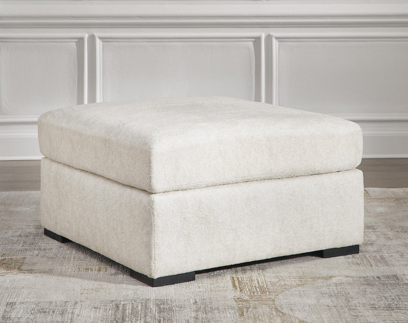 Chessington Ivory 4-Piece Sectional and Oversized Accent Ottoman - 61904U1