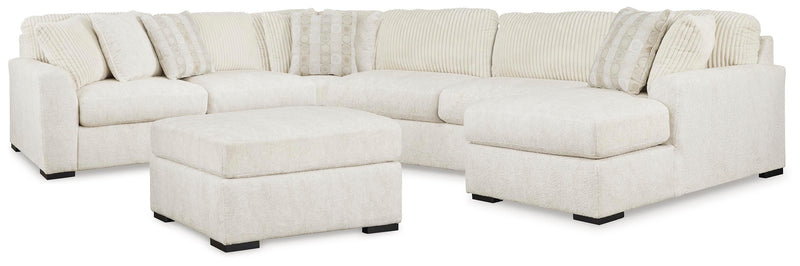 Chessington Ivory 4-Piece Sectional and Oversized Accent Ottoman - 61904U1