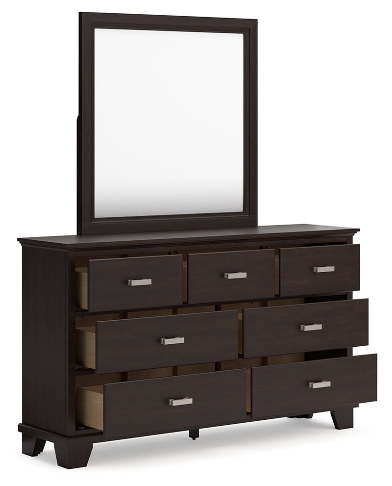 Covetown King Panel Bed with Mirrored Dresser, Chest and Nightstand in Dark Brown from Ashley - Luna Furniture