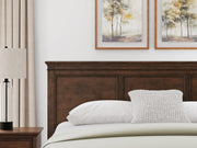 Danabrin King Panel Storage Bed, Dresser, Mirror and Nightstand in Brown - PKG023944