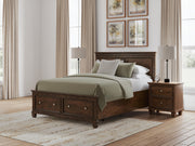 Danabrin Queen Panel Storage Bed, Dresser and Mirror in Brown - PKG023938