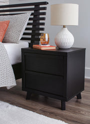 Danziar Black King Panel Bed, Dresser and 2 Nightstands - B1013B14