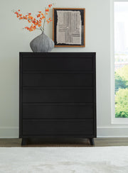 Danziar King Panel Bed, Dresser, Mirror and Chest in Black - PKG015917