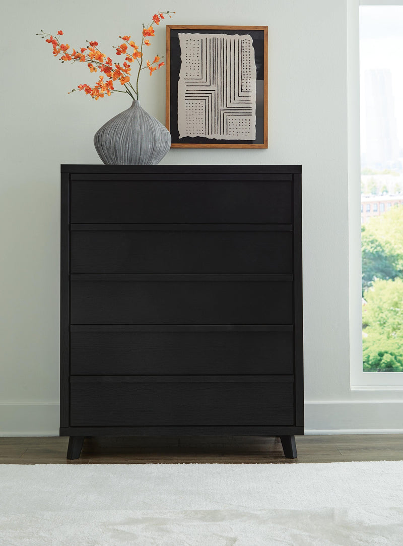 Danziar King Panel Bed, Dresser, Mirror and Chest in Black - PKG015917