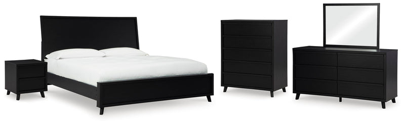 Danziar King Panel Bed, Dresser, Mirror, Chest and Nightstand in Black - PKG015918
