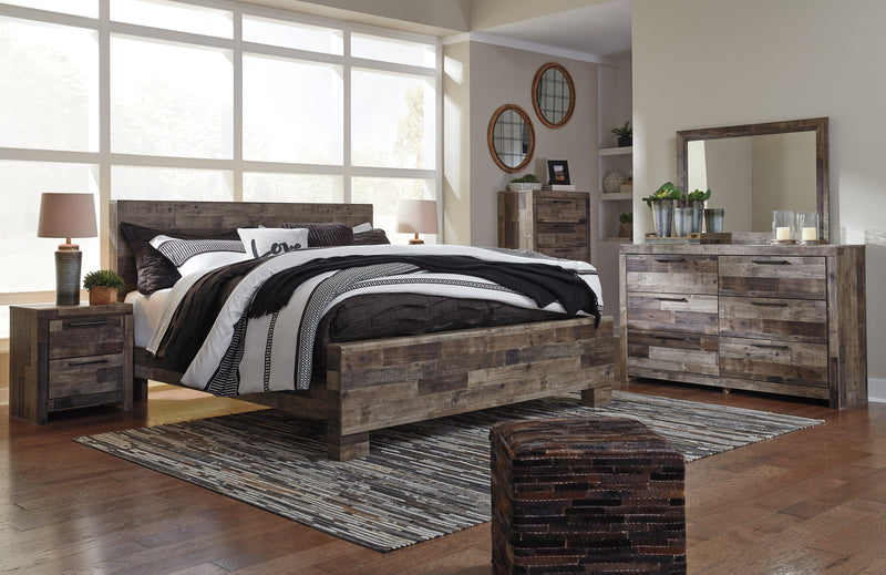 Derekson King Panel Bed with Mirrored Dresser, Chest and Nightstand in Multi Gray - PKG003482