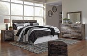 Derekson Multi Gray King Panel Headboard, Dresser, Mirror and Nightstand - B200B47