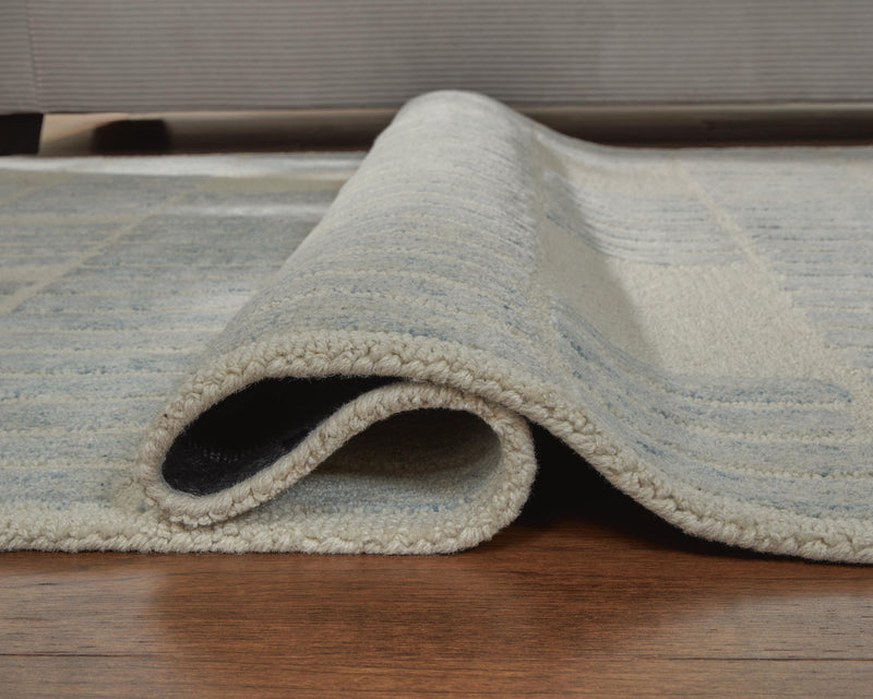 Dylanton Ivory/Blue 5' x 7' Area Rug - R407812