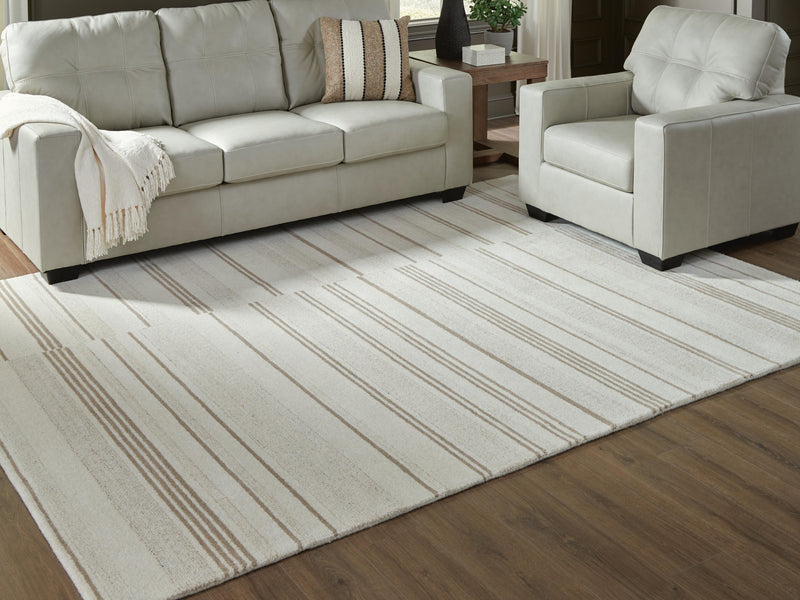 Gadence Ivory/Tan 7'8" x 10' Area Rug - R407641
