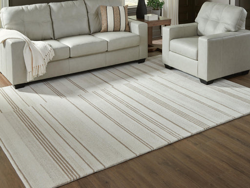 Gadence Ivory/Tan 7'8" x 10' Area Rug - R407641
