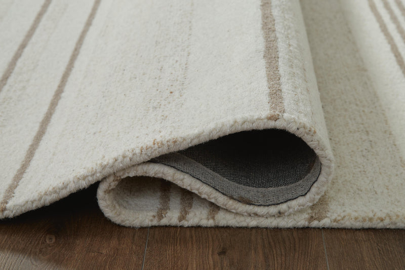 Gadence Ivory/Tan 7'8" x 10' Area Rug - R407641