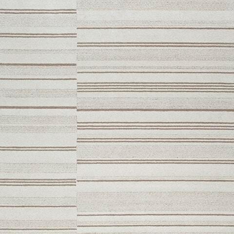 Gadence Ivory/Tan 7'8" x 10' Area Rug - R407641