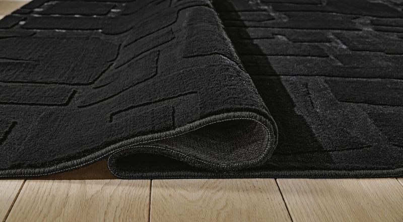 Gibbswell Black Washable 8' x 10' Area Rug - R407461