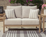 Hallow Creek Outdoor Sofa and Loveseat with Coffee Table in Driftwood - PKG021264
